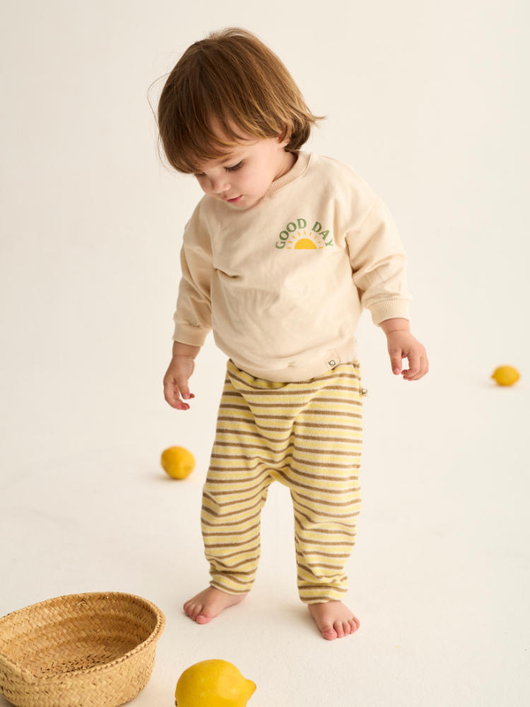 Cozmo - soft fleece baby sweater Good Day ivory