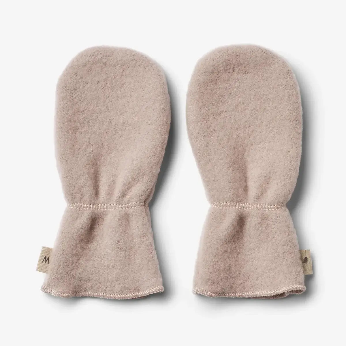 Wheat's soft merino wool mittens for babies, perfect for keeping little hands warm in cold weather.