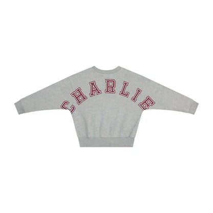 Charlie Petite Jones Sweater in Grey Melange with bold 'CHARLIE' lettering on back, perfect for stylish comfort.