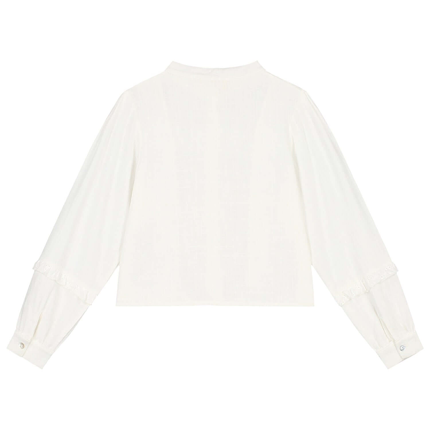 Back view of the Charlie Petite Charmaine Blouse in white, featuring long sleeves and ruffles for girls.