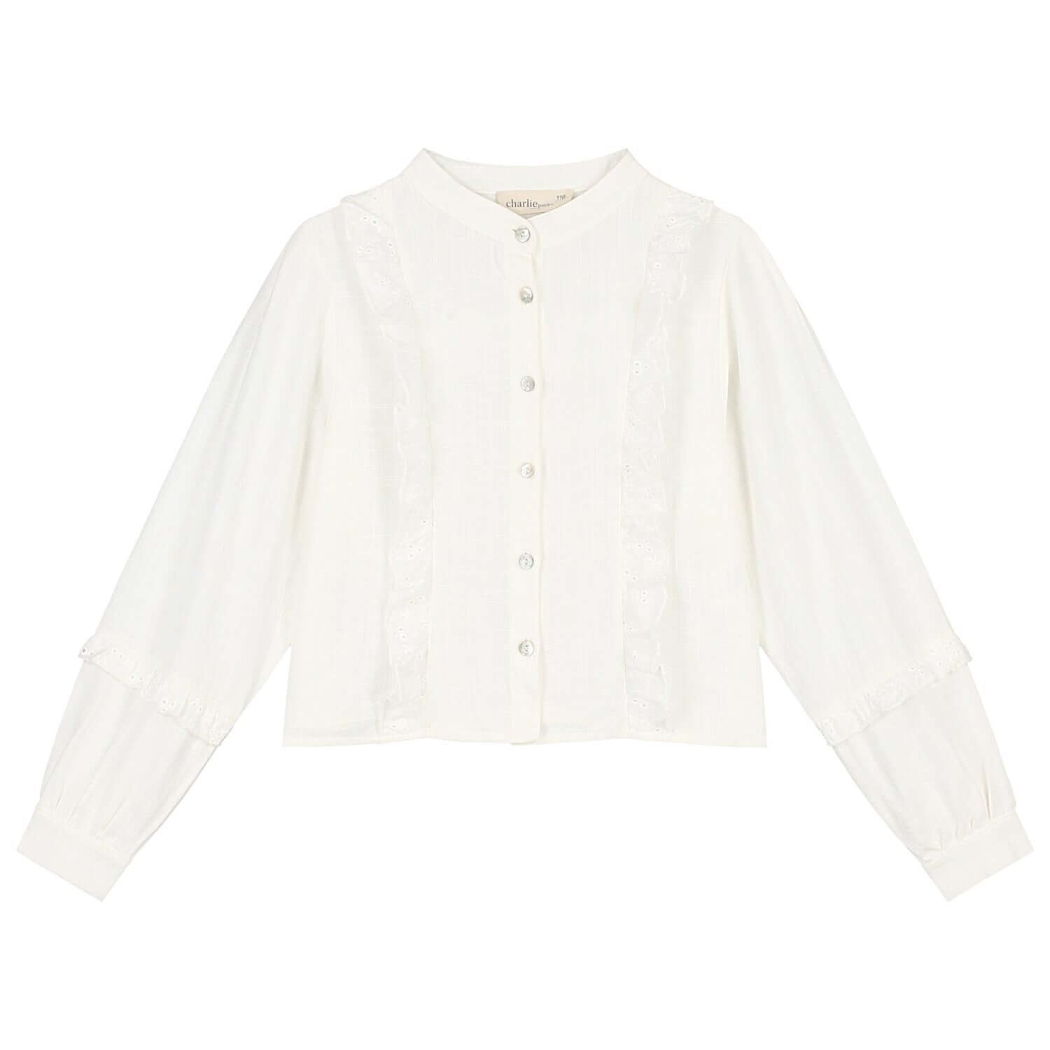 White Charmaine blouse for girls with long sleeves and ruffles, perfect for stylish outfits.