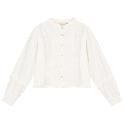 White Charmaine blouse for girls with long sleeves and ruffles, perfect for stylish outfits.