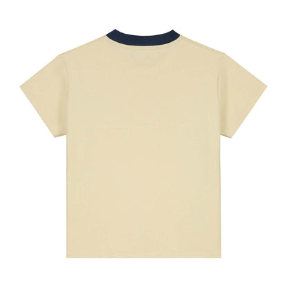 Back view of Charlie Petite Luc T-Shirt in cream with indigo collar, showcasing its stylish and casual design.