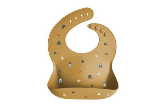 Cotton Cloud orange bib with bird designs, easy to clean for messy toddler meals. Perfect for mealtime fun!